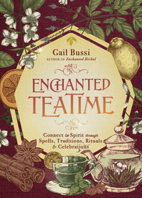 Burgundy and yellow cover with teapot and various herbs