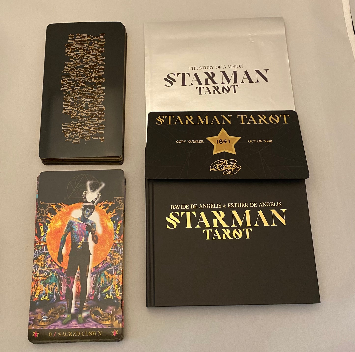 Starman Tarot cards with packaging on a light gray background