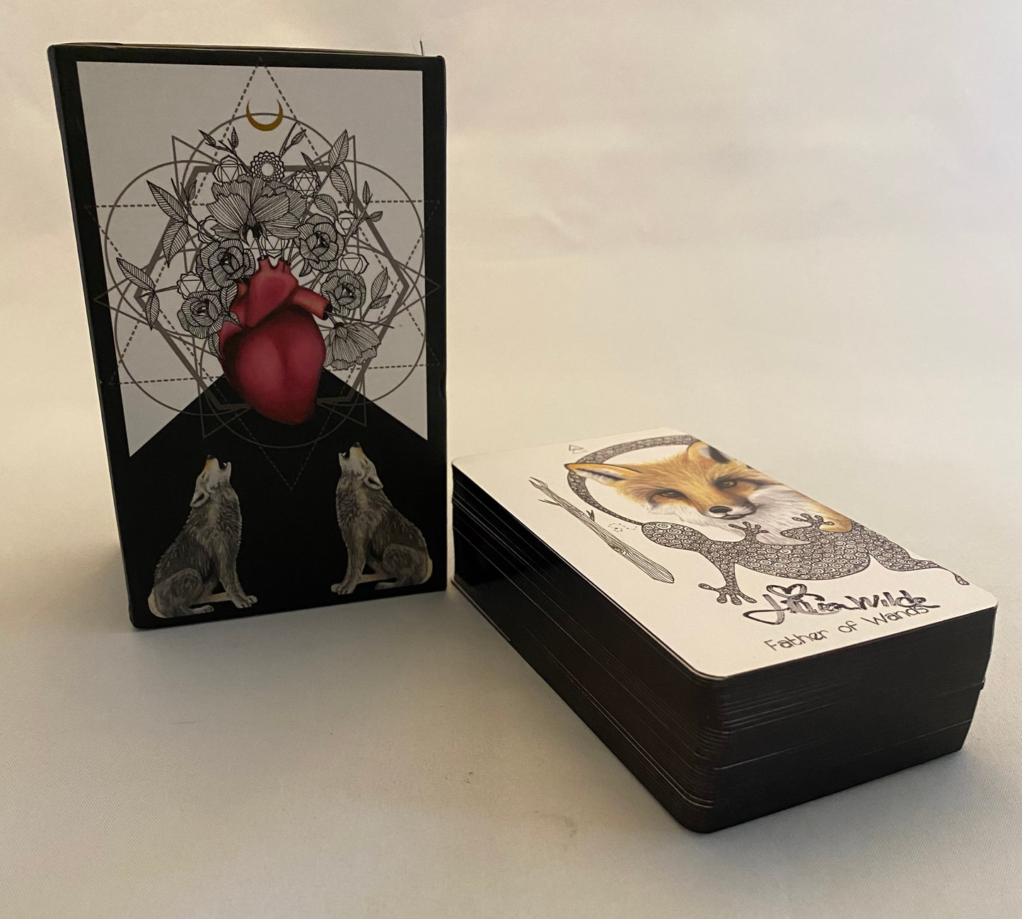 Set of tarot cards with intricate designs on a white background