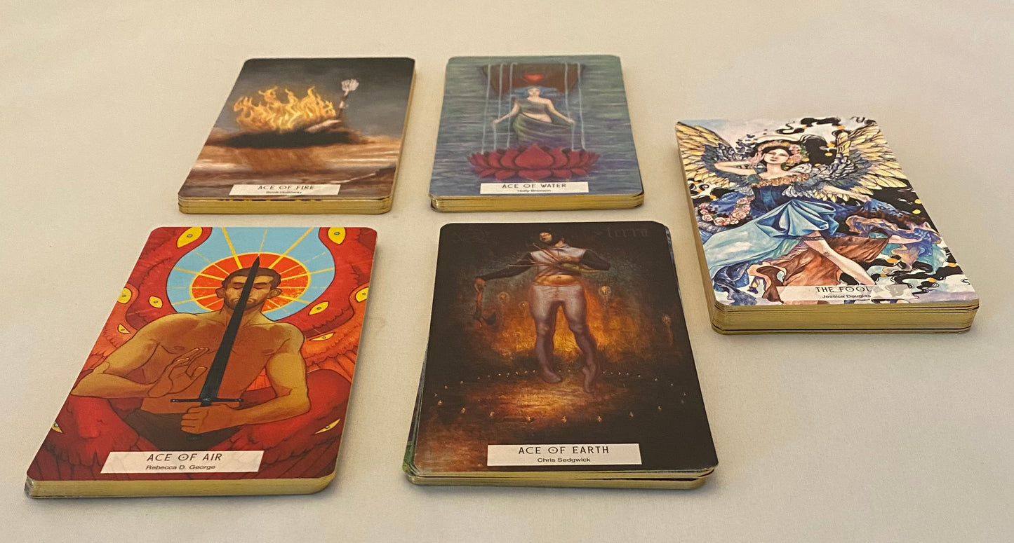 Five tarot cards with colorful artwork on a light gray background