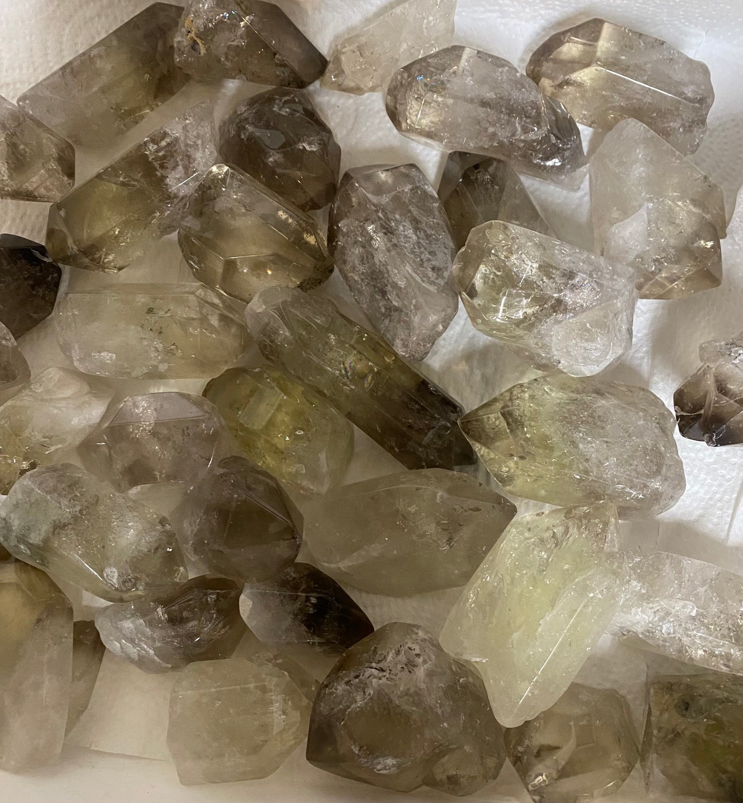 Close-up of raw crystal stones on a white background