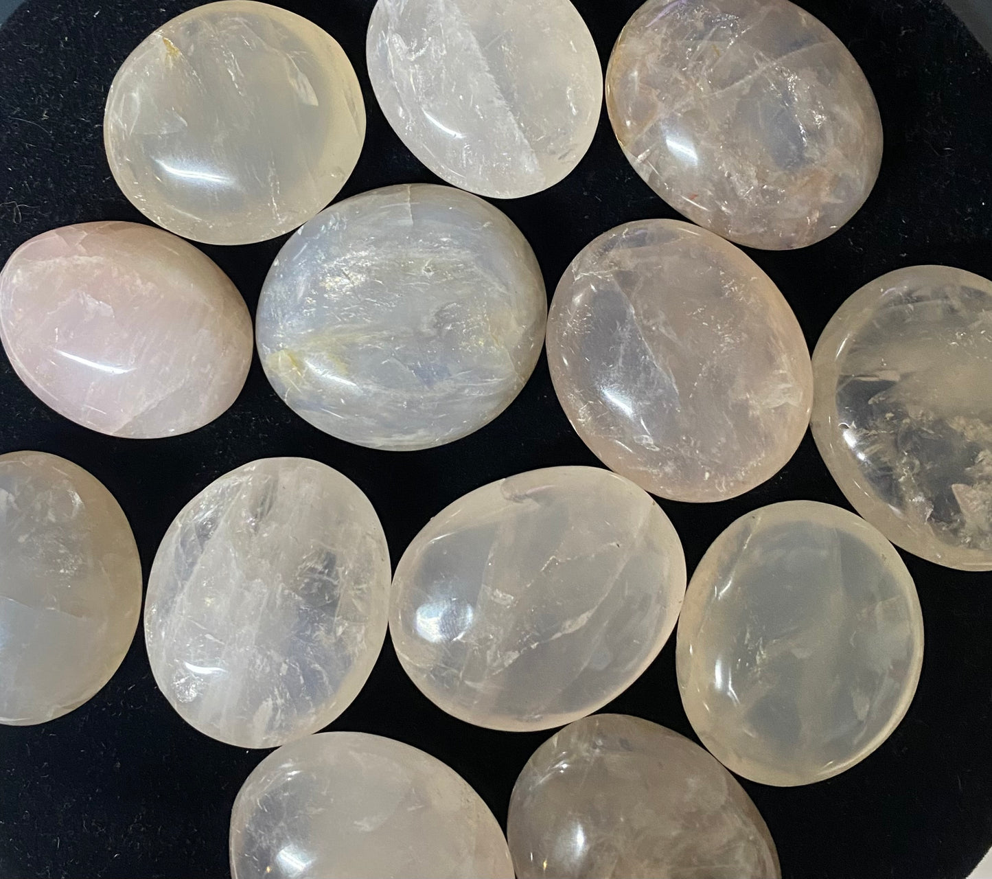 Collection of translucent gemstones on a dark background