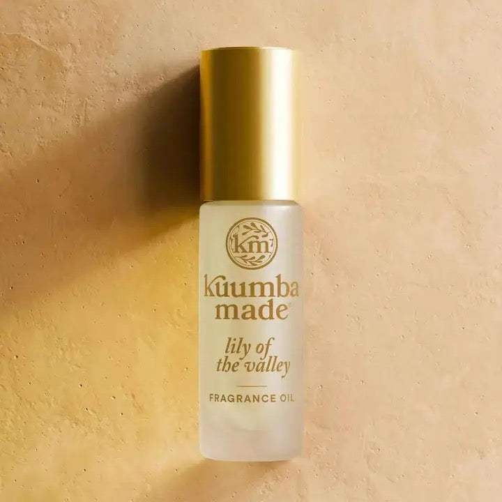 Kåumba Made fragrance oil bottle on a beige background