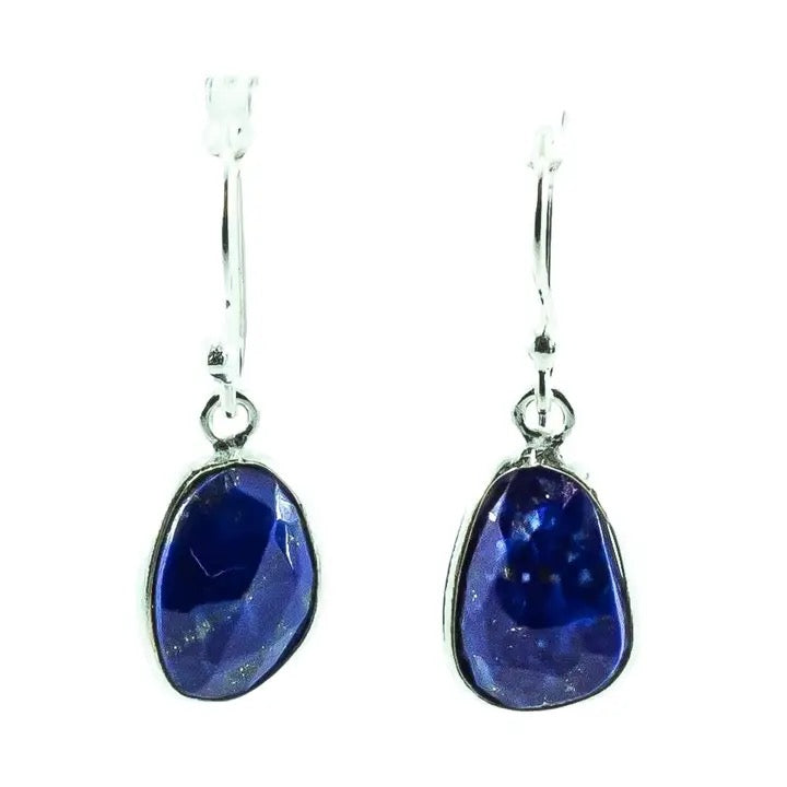 Pair of silver earrings with blue teardrop-shaped stones on a white background