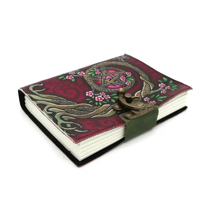 Triple Moon Pentacle Tree Leather journal 5 x 7 inch on white background on side