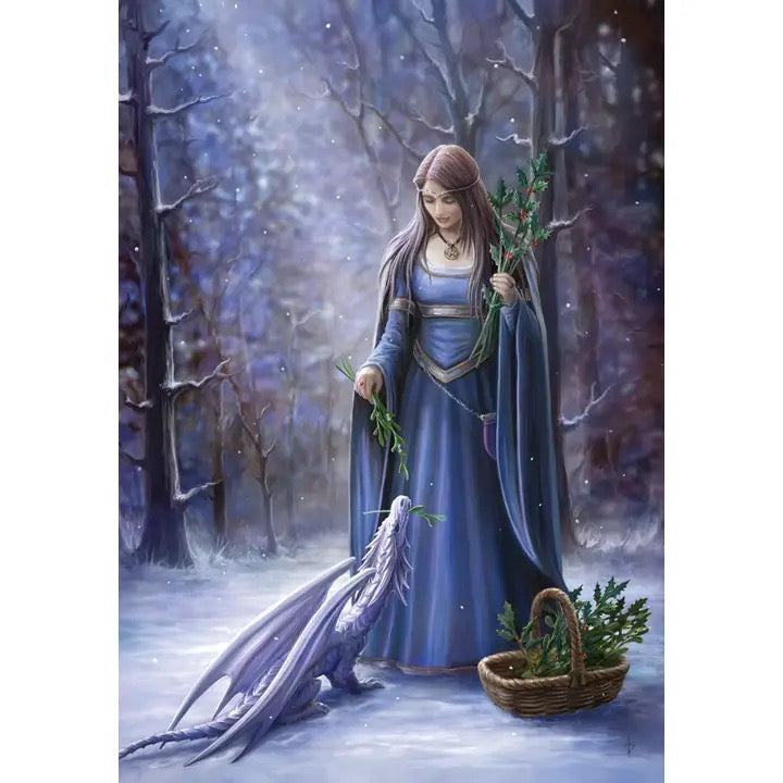 Woman in a blue dress holding a basket and plants in a snowy forest