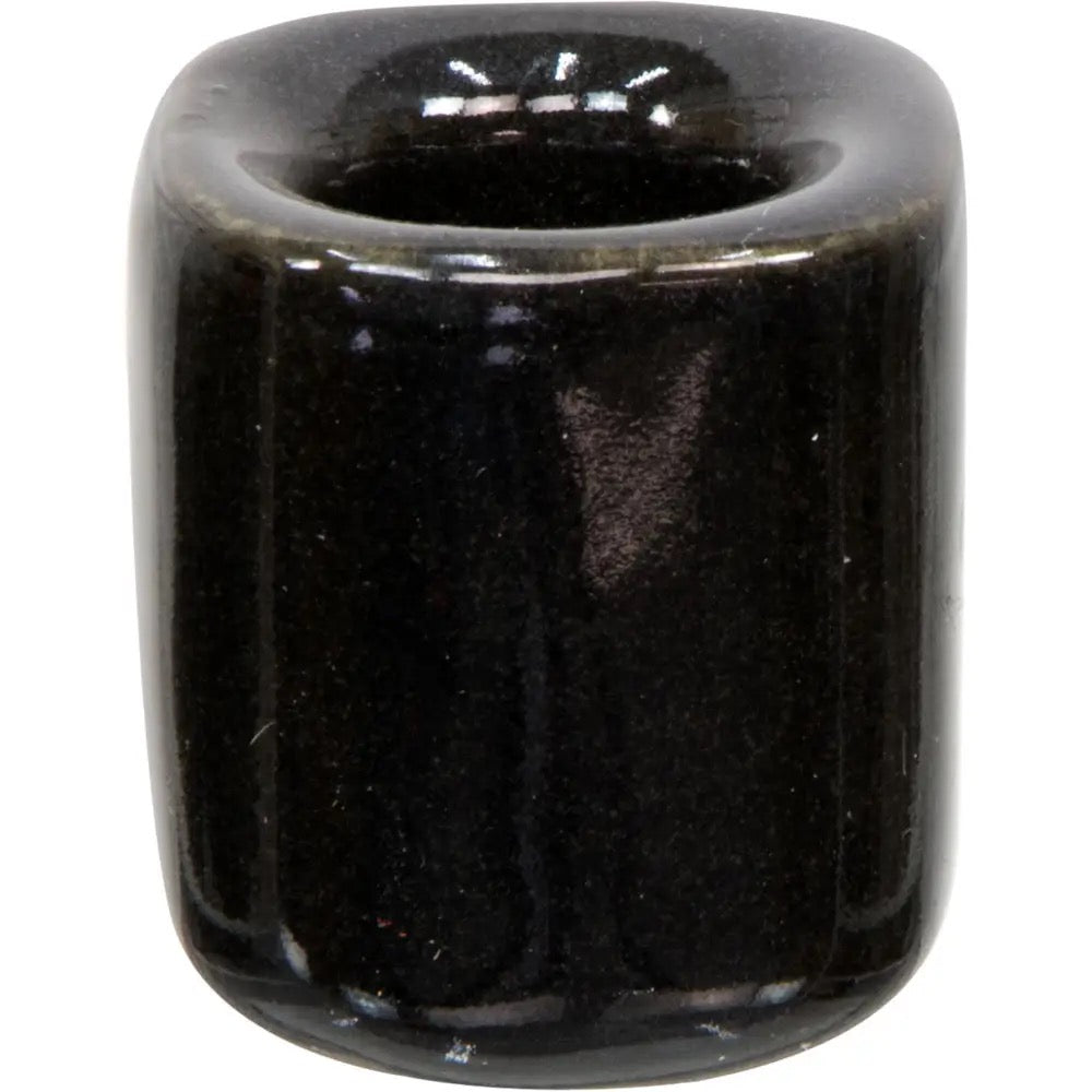 Black ceramic candle holder on a white background