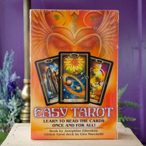 Easy Tarot book and tarot cards packaging with a purple background