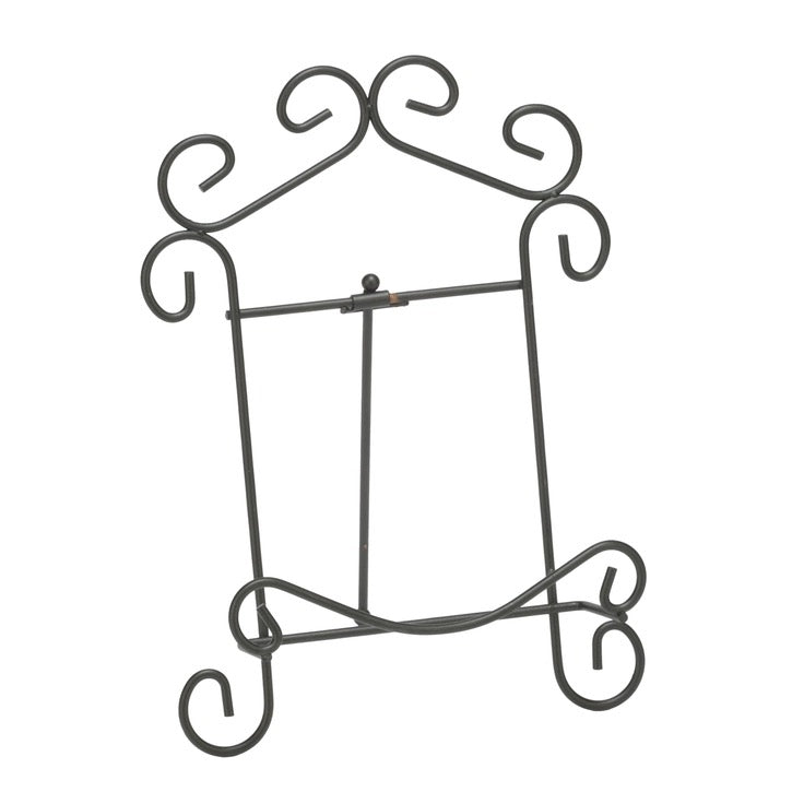 Black wrought iron decorative book rack with scrollwork details, shown on a plain white background.