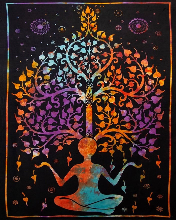 Colorful tapestry with a tree of life design on a black background