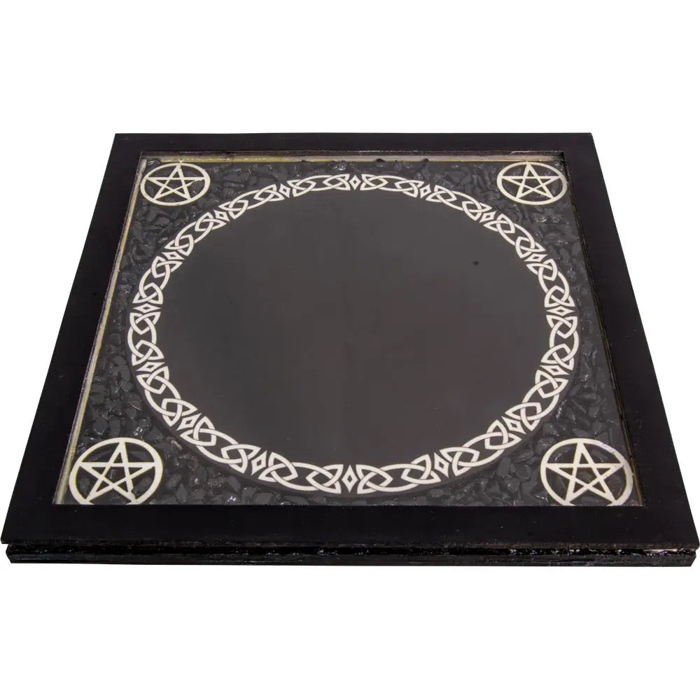 Black square mirror with circular design and pentagram symbols on a white background