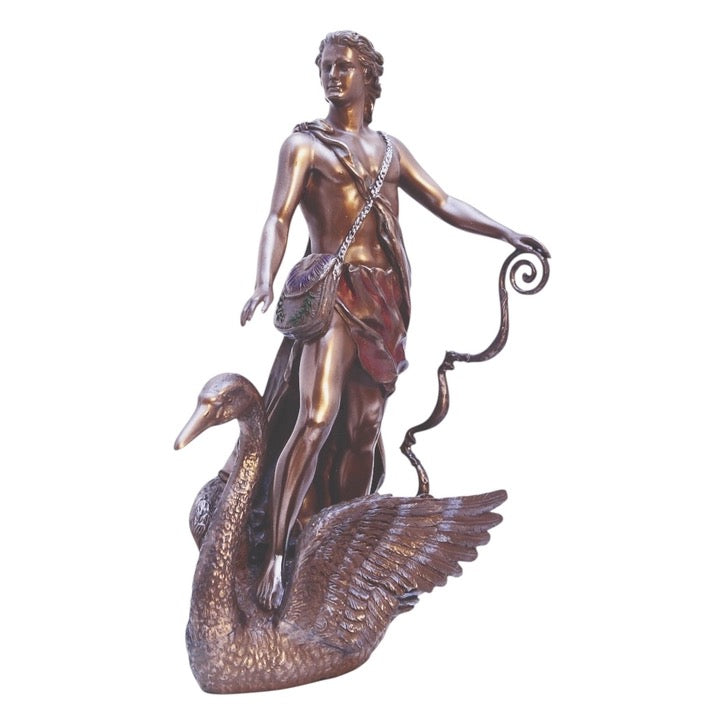 Bronze-finished sculpture of a classical male figure standing on a swan, with draped fabric and a curved staff, shown against a plain white background.