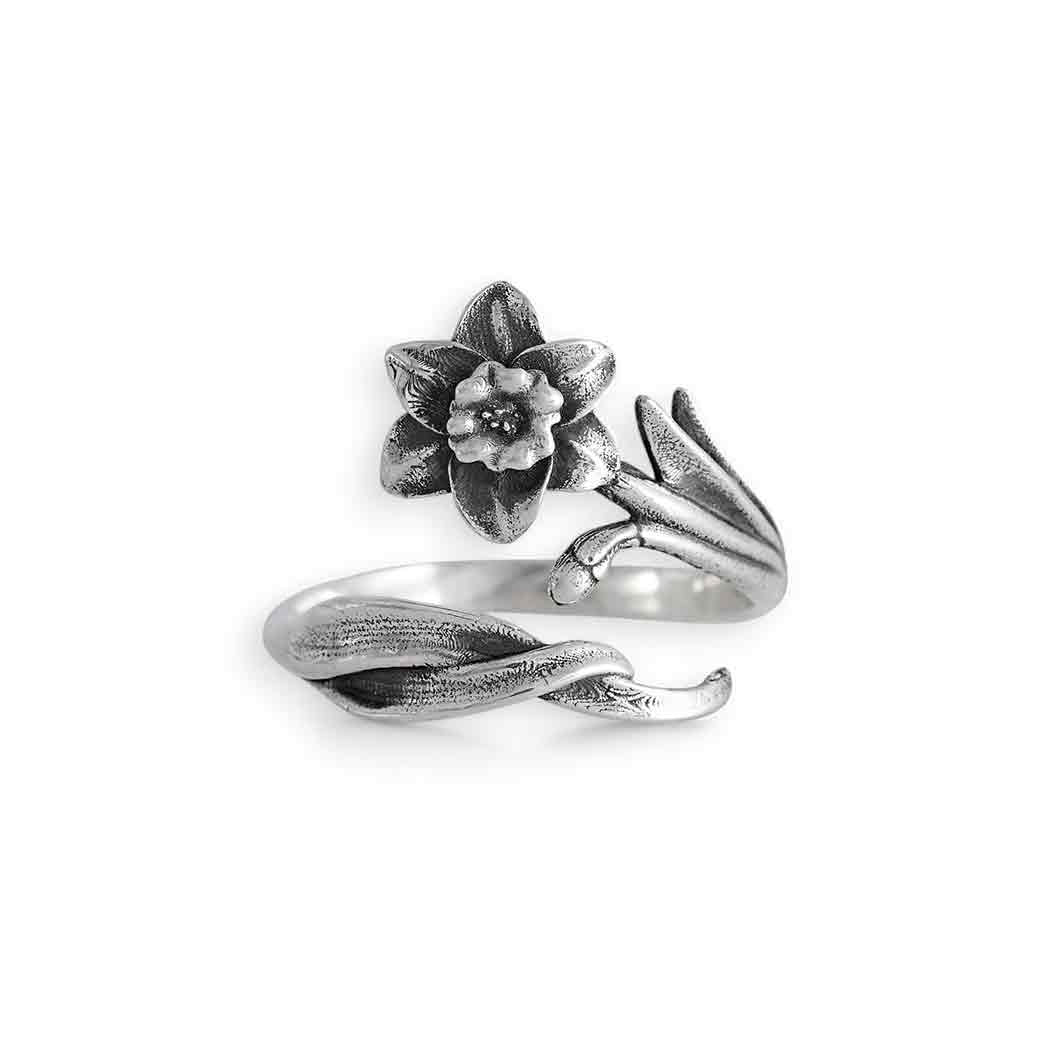 Silver ring with Daffodil design on a white background