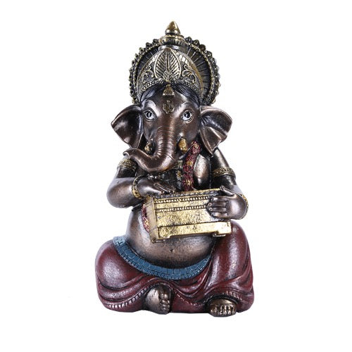 Statue of a seated deity holding a harmonium on a white background