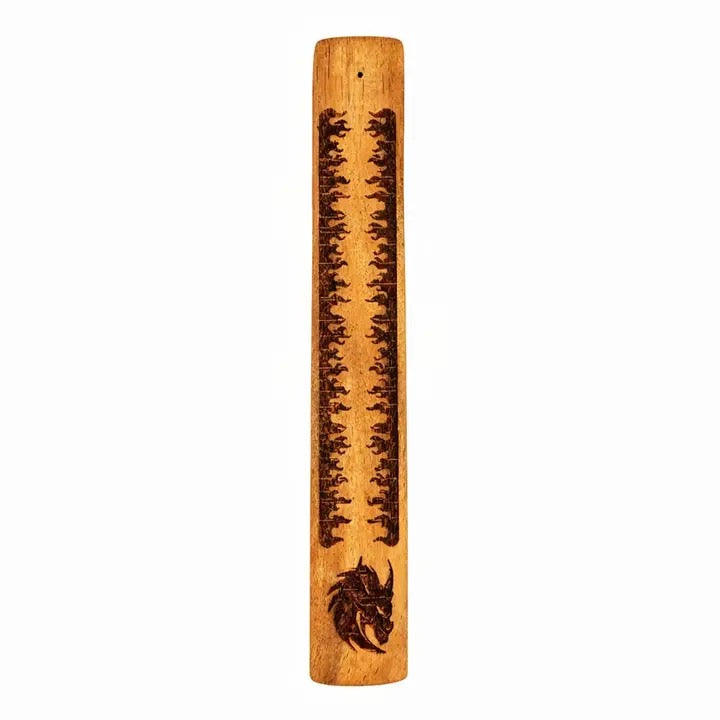 A vertical wooden incense burner with a natural light brown wood finish, featuring dark brown engraved markings, a dragon design near the bottom, and a small hanging hole at the top.