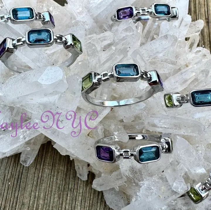 Ring Tri Stone Topaz Amethyst Peridot on quartz crystal