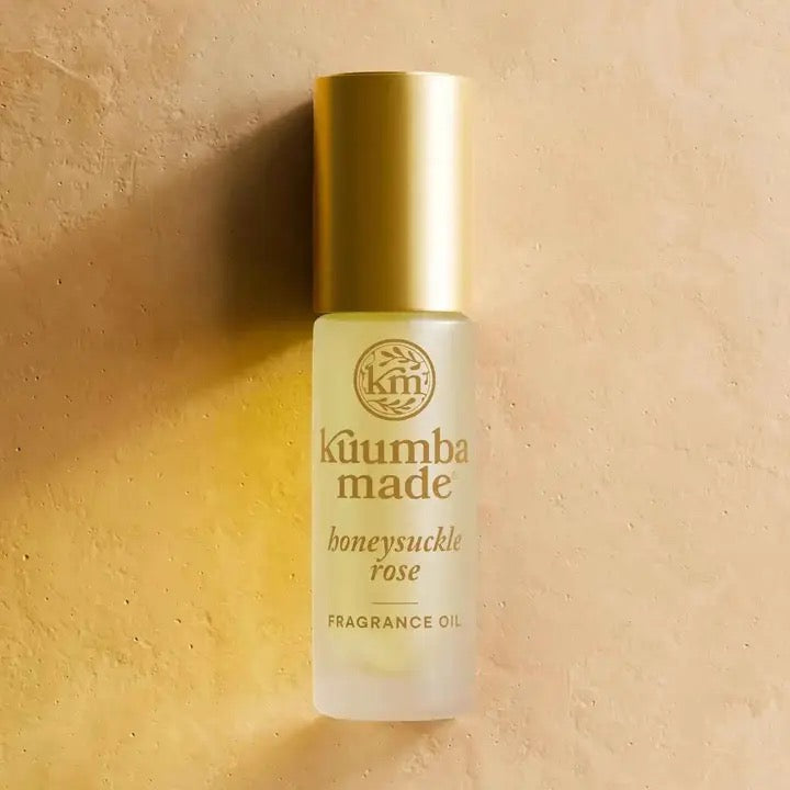 Käumba Made honeysuckle rose fragrance oil bottle on a beige background