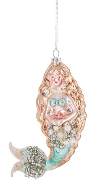 Mermaid ornament with decorative elements on a white background