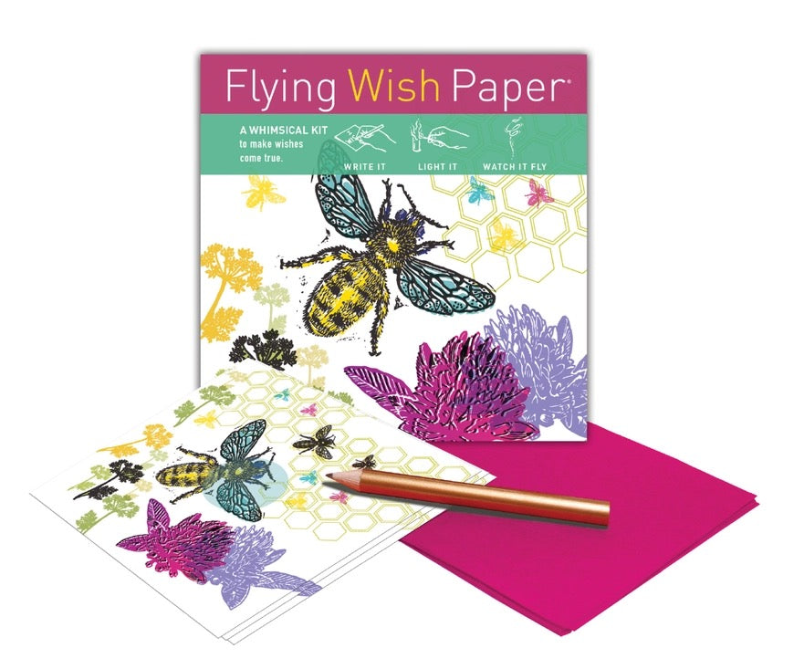 Flying Wish Paper kit with colorful designs and a pen on a white background