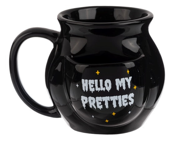 Black mug with 'Hello My Pretties' text on a white background