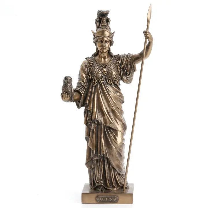 Bronze statue of a classical figure holding an owl and a spear on a white background