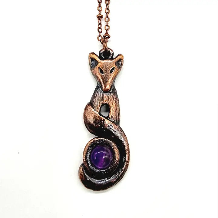 Fox necklace on a white background