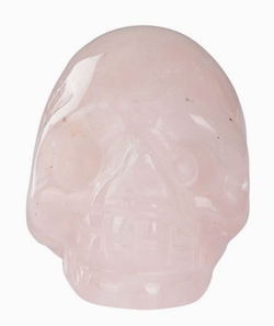 Stone Skull Rose Quartz on a white background