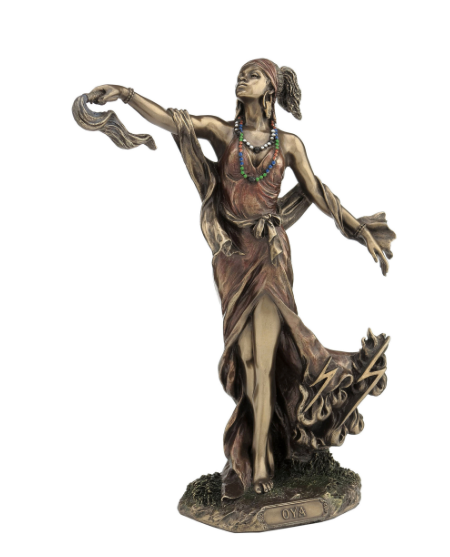 Bronze statue of a woman with outstretched arms on a white background