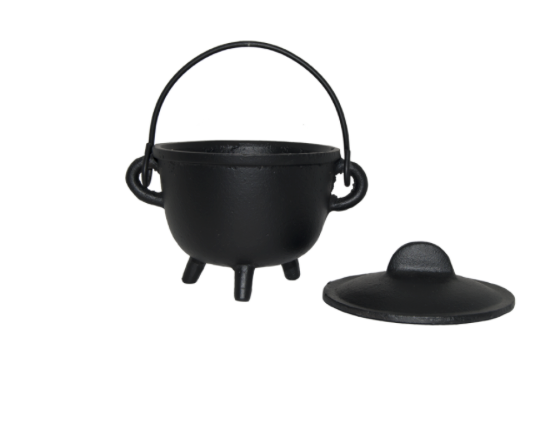 Black cast iron pot with lid on a white background