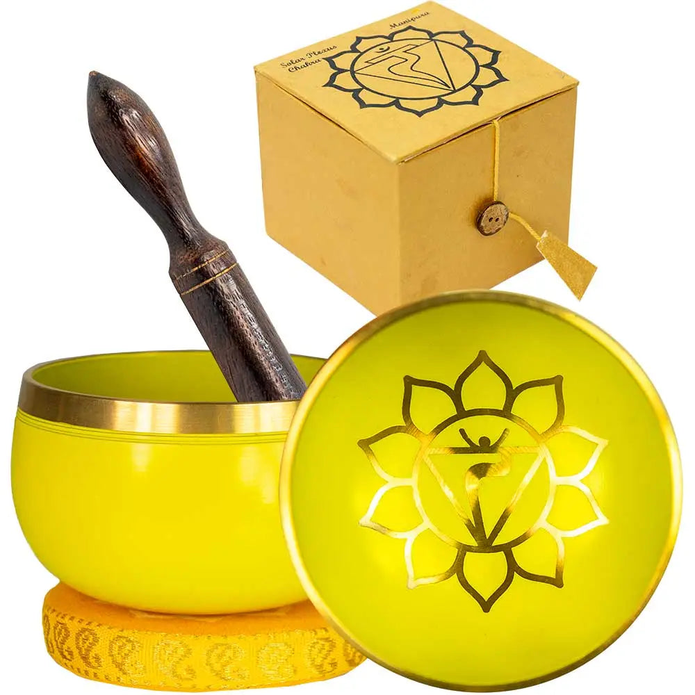 yellow colored singing bowl