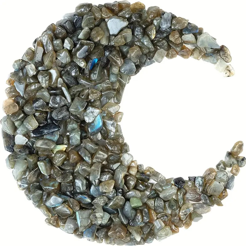 tiny, smooth, tumbled stones, in varying shades of grey, brown, black, with reflective pieces of blue and silver.