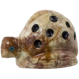 Carved dolomite creature