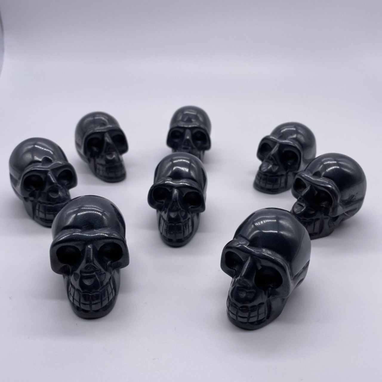 Black skull-shaped onyx on a white background