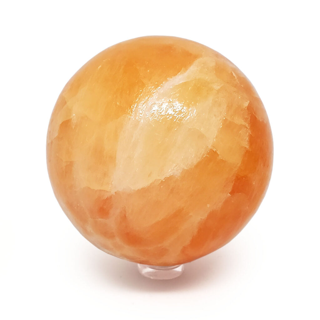 Orange crystal sphere on a white background