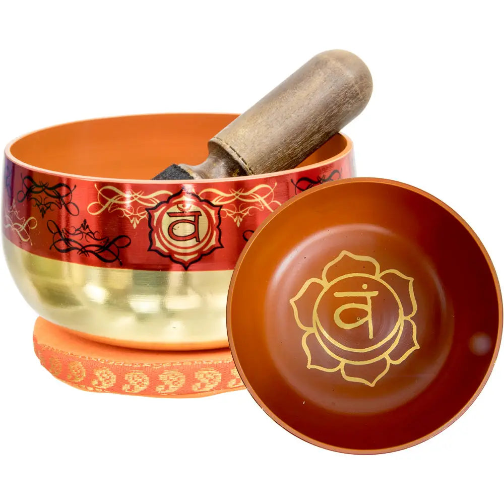 singing bowl, brass and red with sacral chakra image