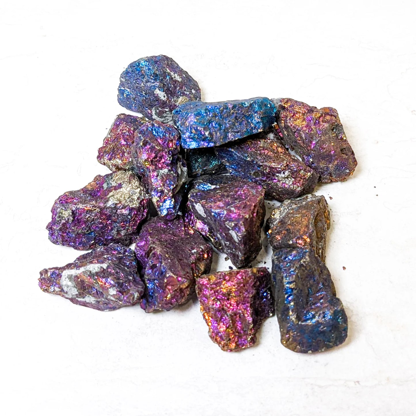 Turquoise, blue, and purple, colored raw stones