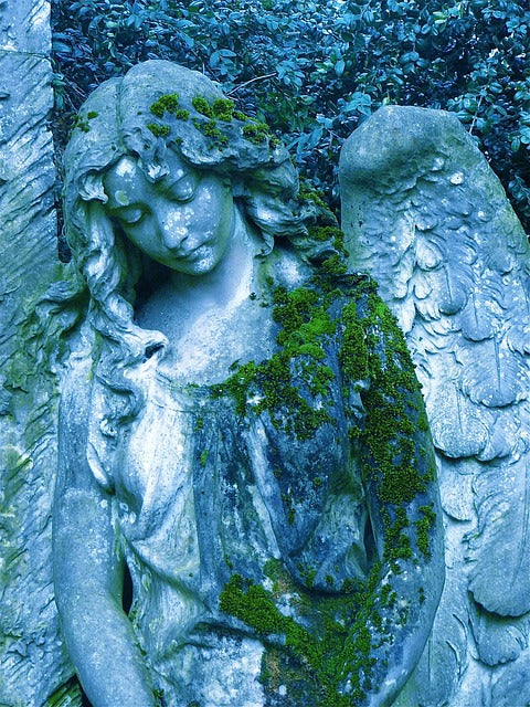 Stone Carved Angel with moss