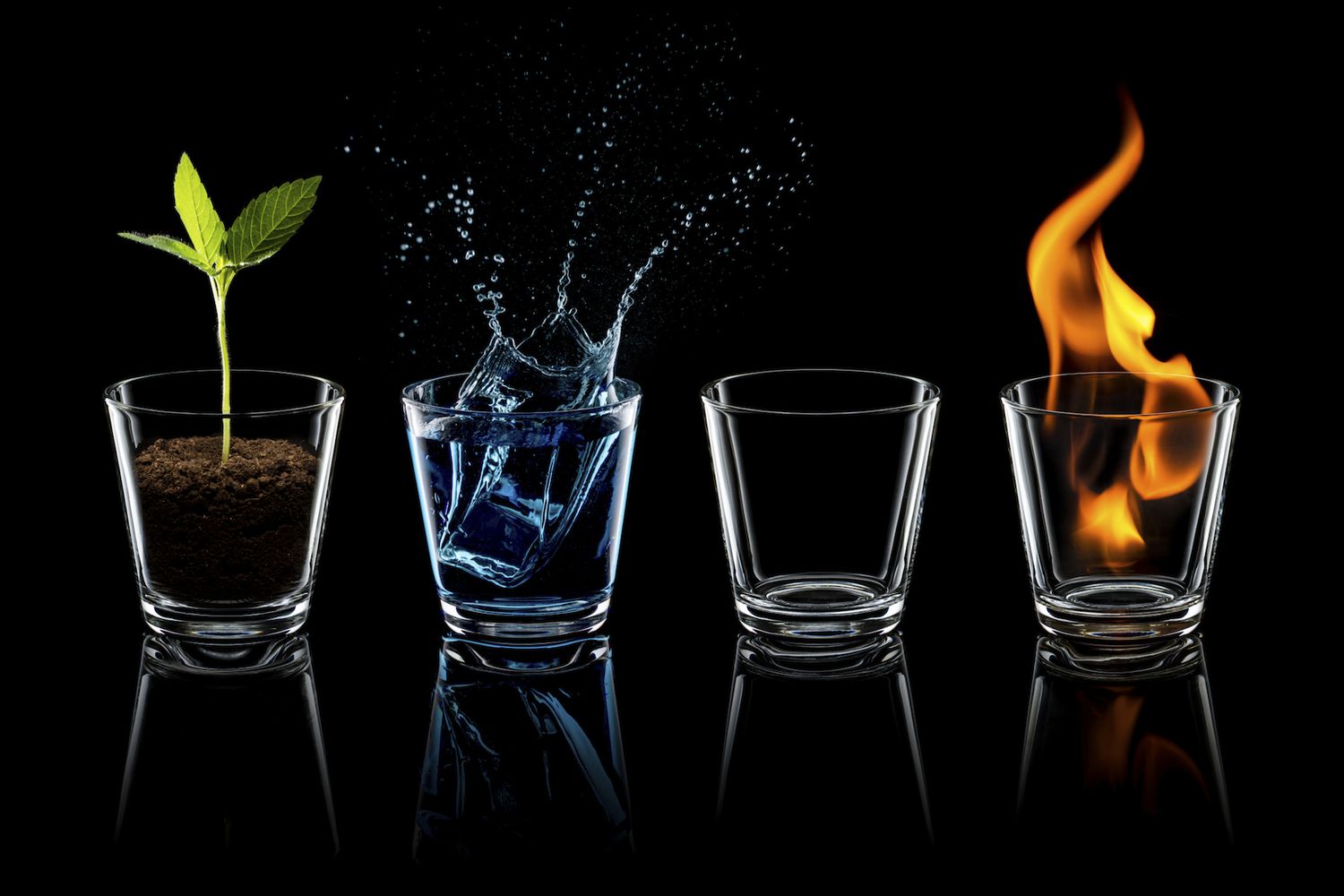 Four elements displayed in shot glasses