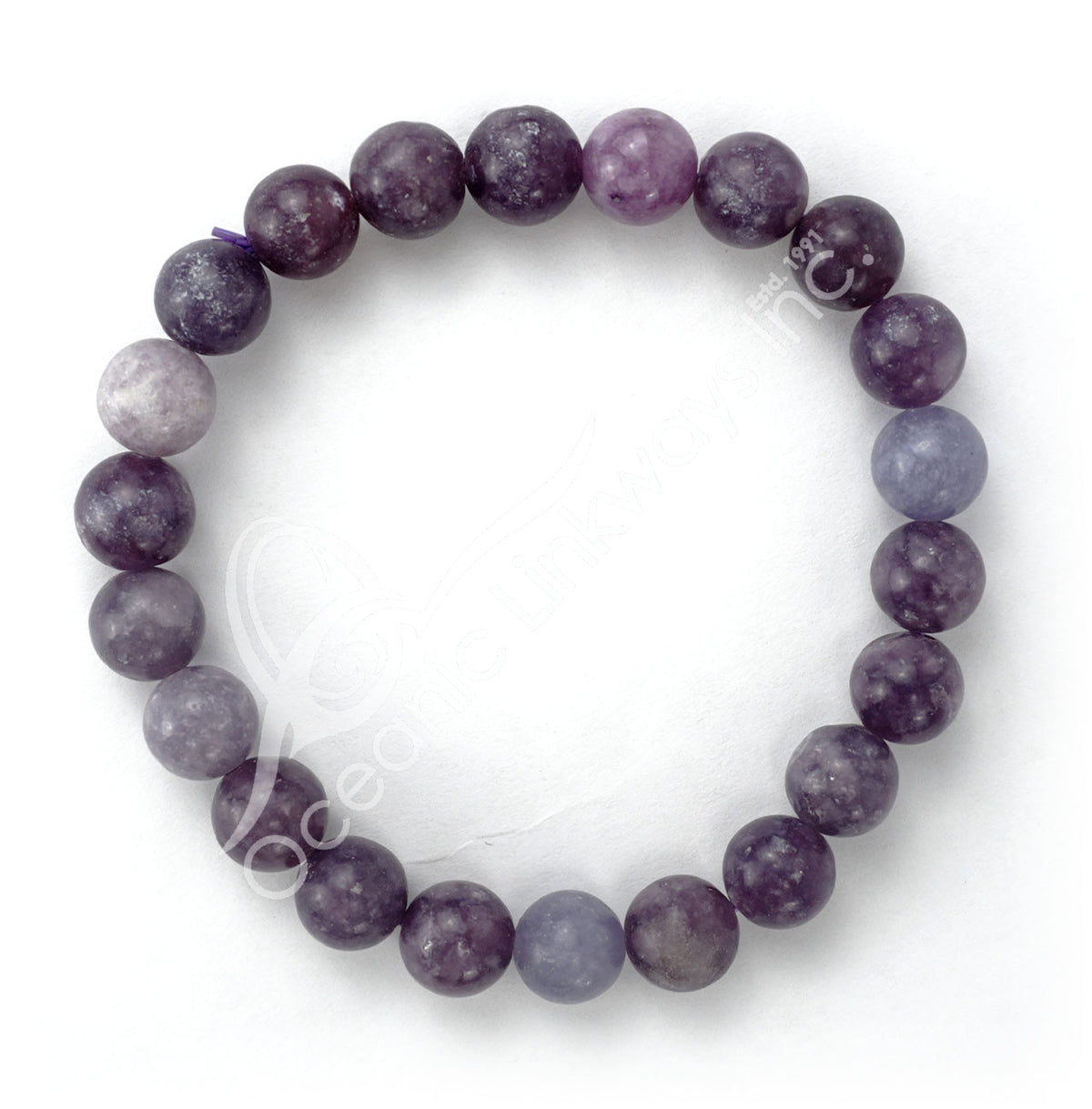 A beaded stretch bracelet made of round purple and lavender-gray gemstone beads, displayed on a clean white background.