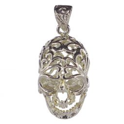 silver filigree skull on white background
