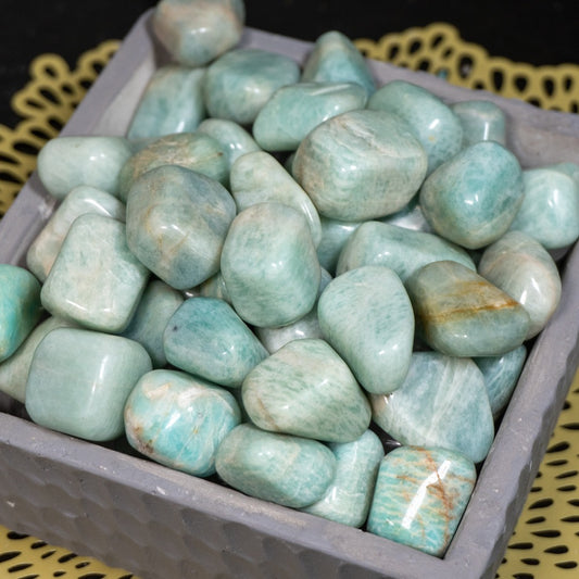 greenish blue stones with white and orange inclusions