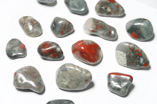 smooth, tumbled, Green, semi-translucent stones with opaque red spots