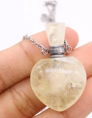 Necklace with a round pendant on a white background