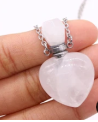 Heart-shaped pendant with a white stone on a chain