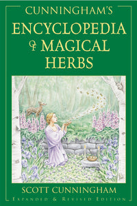 green cover with image of a female in a  garden with a deer in the background