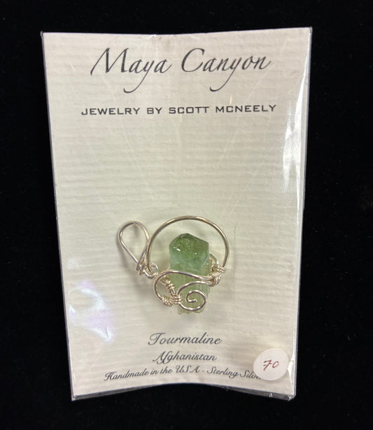 Green Tourmaline Pendant wrapped in sterling silver pendant form.