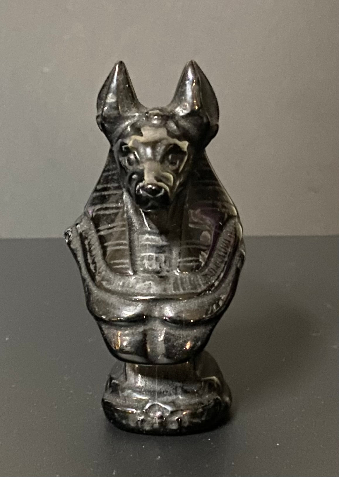 Obsidian Anubis Bust on a black background.