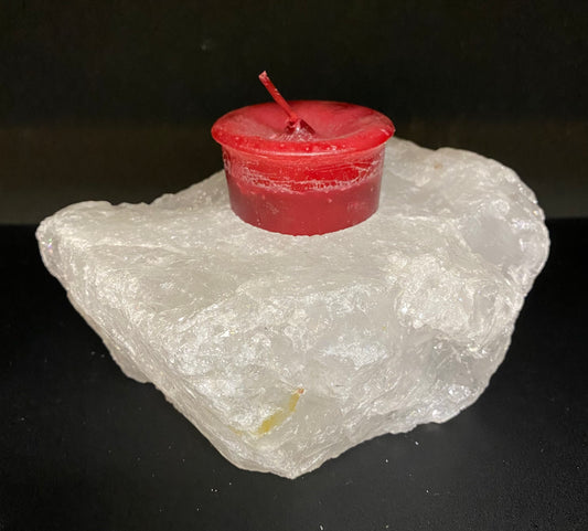 Candle Holder Quartz Block, rough shaped displaying a red candle