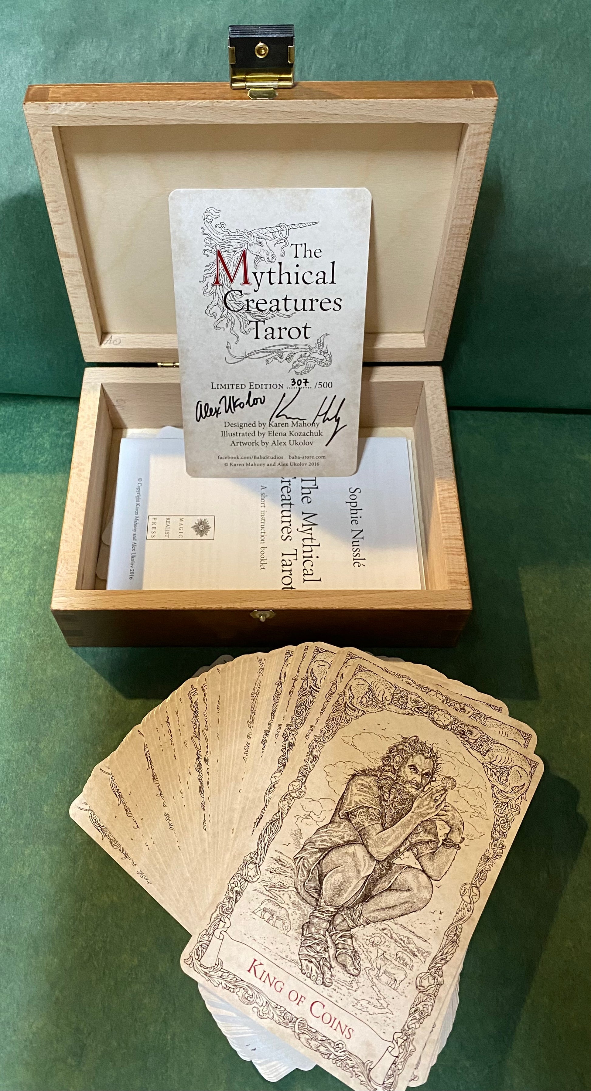 box, authenticity card, and cards spread out