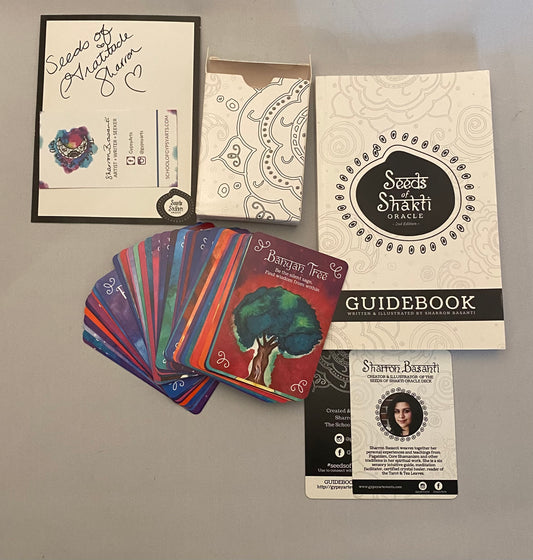 tarot cards, book and box